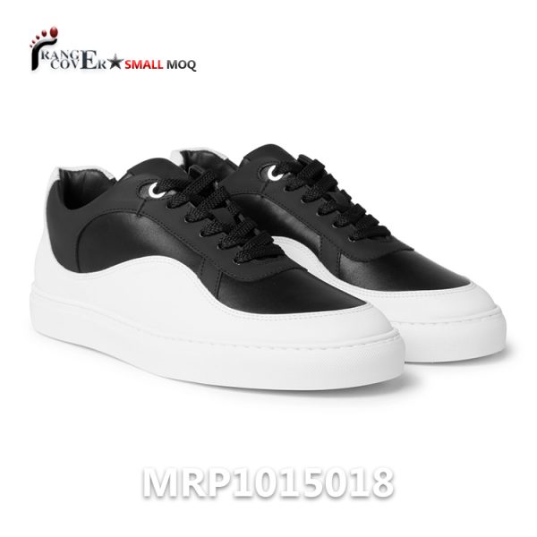 Two-Tone Leather Sneakers is made by black and white genuine leather. White lace in cotton. White rubber soles with stitching. All details we can make customized or we can make your design.